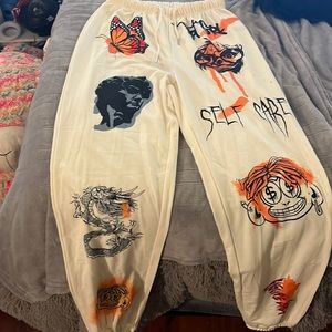 Graphic cream sweatpants